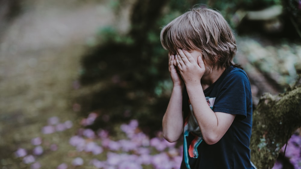 Boy counting breaths for a peaceful mind.