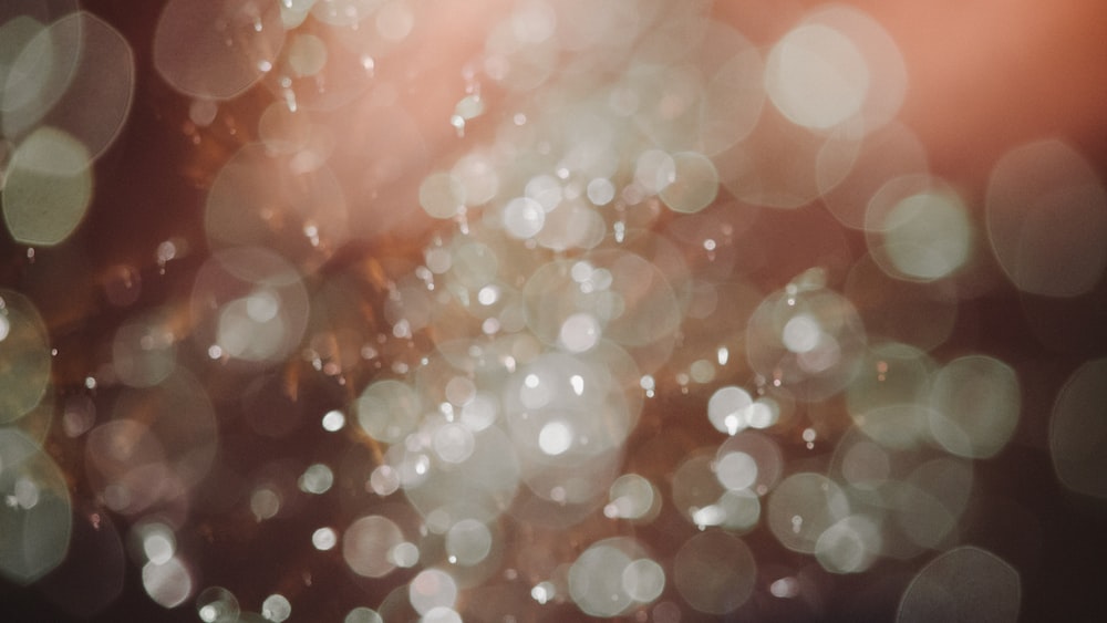 Captivating Celebration of Success with Dazzling White Bokeh Lights