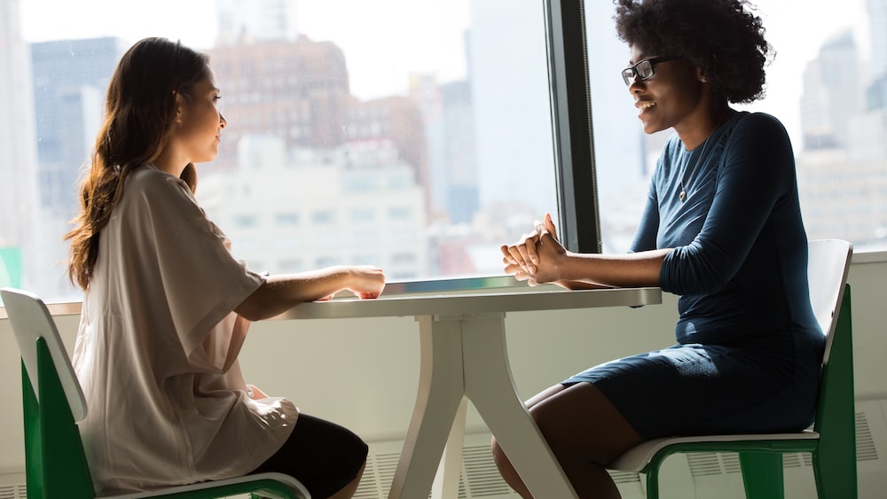 Coaching Conversations: Two Women Engaged in Active Listening