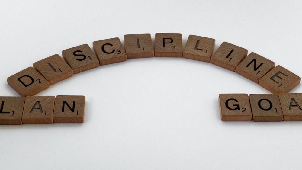 Discipline in Action: Scrabble Pieces as Visual Metaphor for Persistence and Hard Work