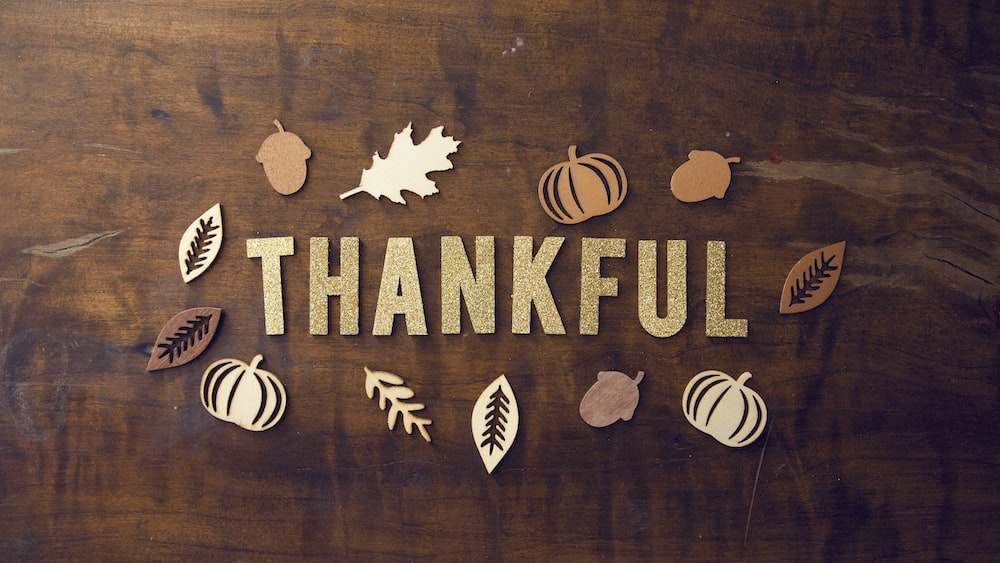 Expressing Gratitude on a Brown Wooden Board