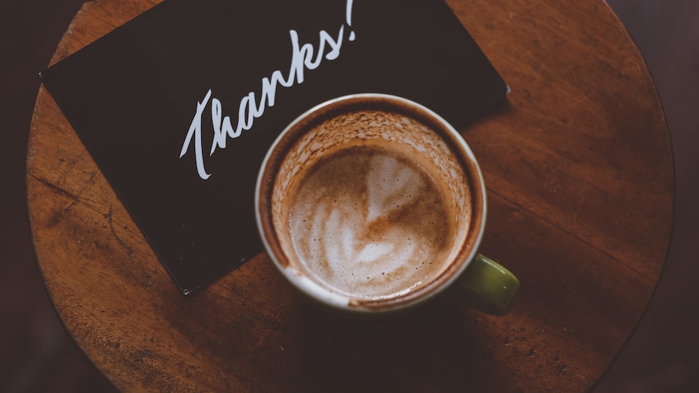 Expressing Gratitude with a Coffee Latte and Thanks Postcard