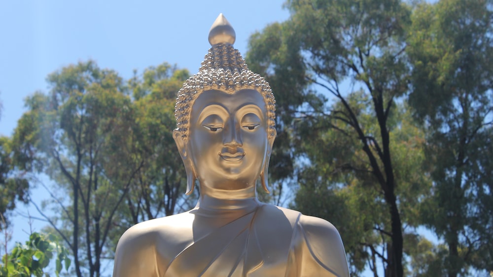 Golden Buddha: A Visual Reminder of Self-Compassion and Forgiveness