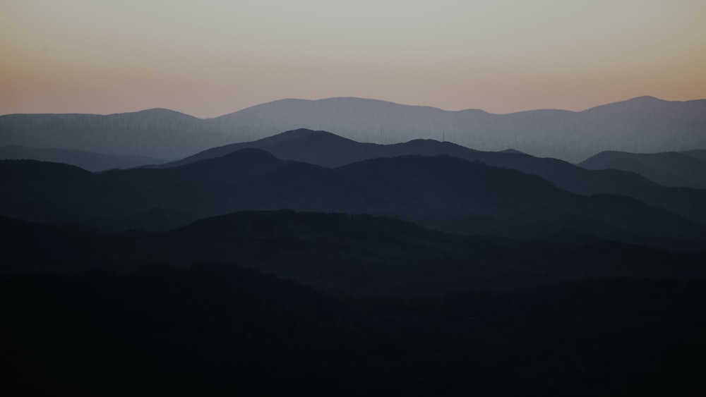 Layer Archiving: Black and Green Mountain Silhouette