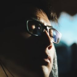 Man Practicing Empathetic Listening with Closed Eyes