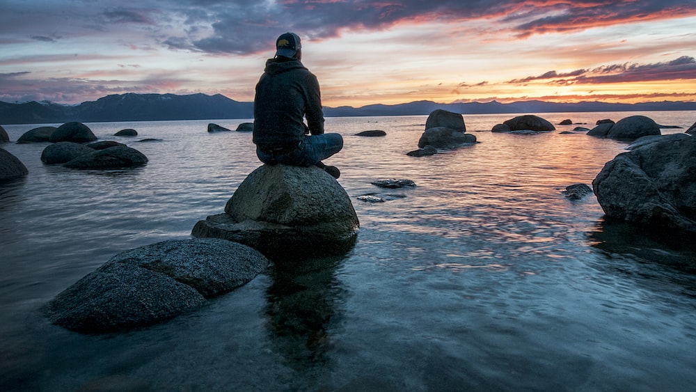 Man Practicing Mindfulness at Lake Tahoe