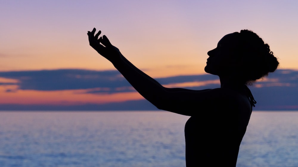 Mastering Mindfulness: Embracing Presence with a Raised Hand