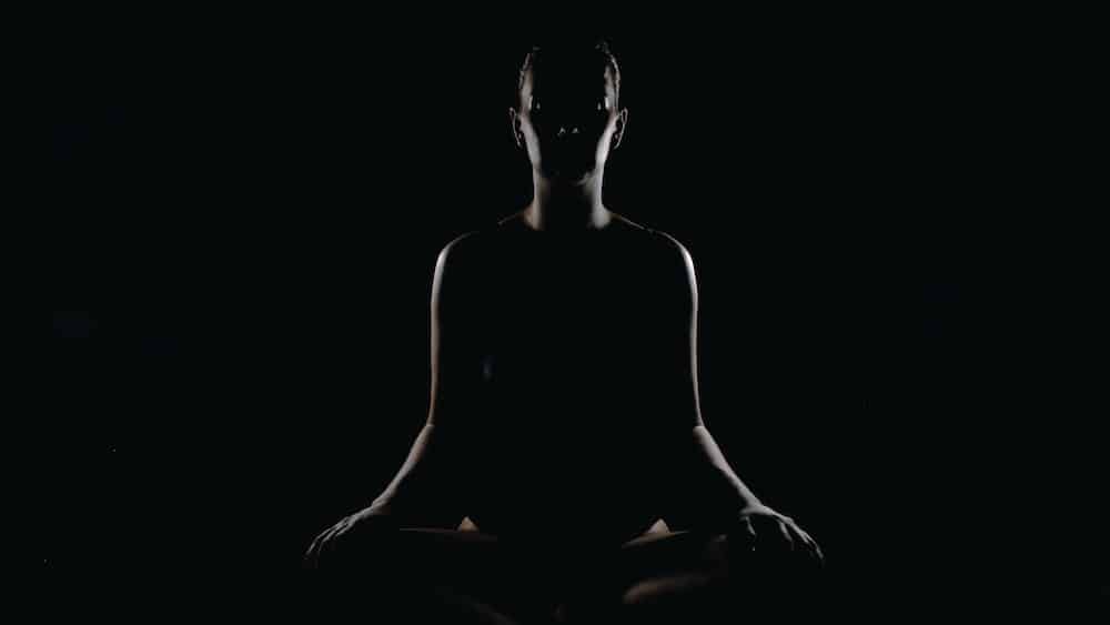 Mastering Mindfulness: Person in Meditation Pose