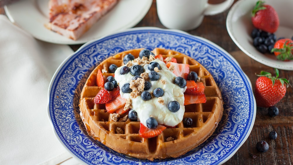 Mindful Breakfast: Fruit Waffles & Coffee on Blue Plate