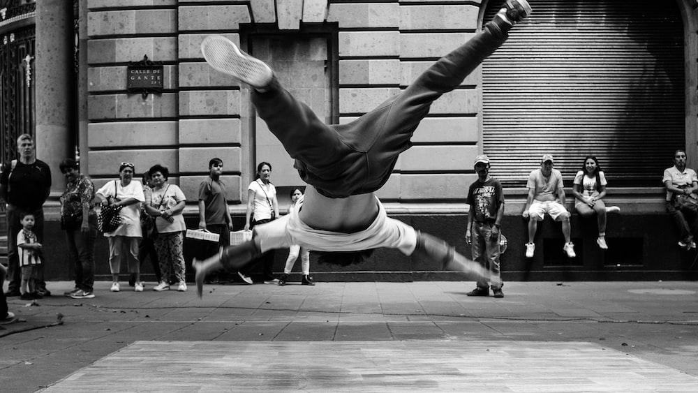 Mindful Movement: Capturing the Graceful Jump of a Break Dancer