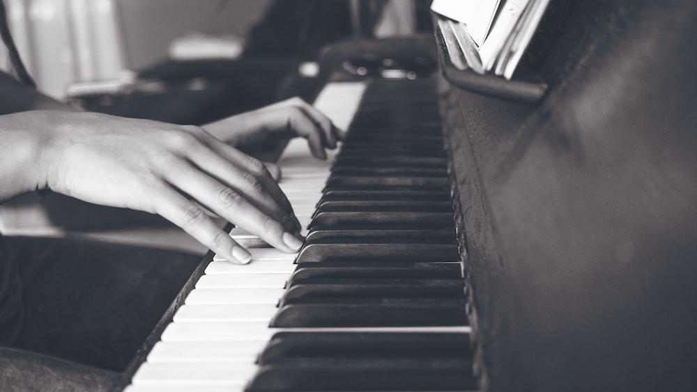 Mindful Music: Female Pianist Playing Upright Piano