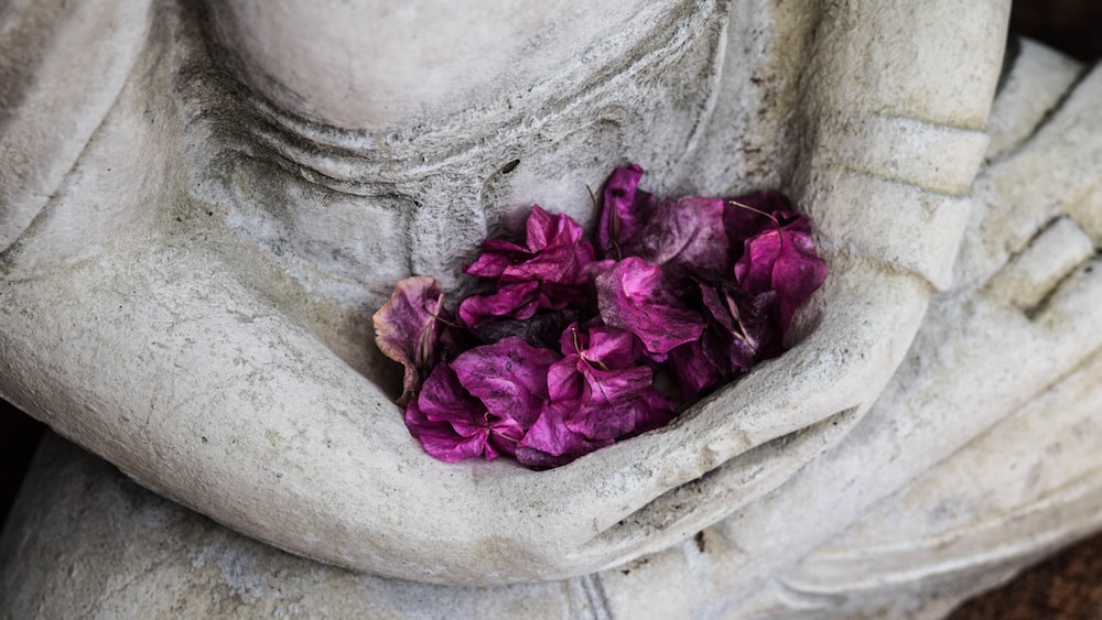 Mindful Statuette with Flowers