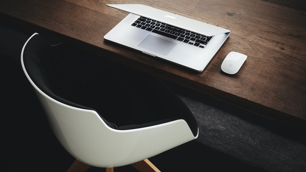 Mindful Technology: Apple MacBook and Mouse on Desk