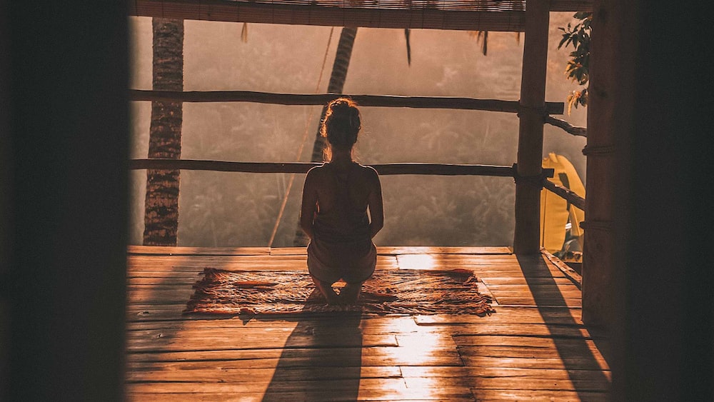 Mindful Yoga at Sunrise: Meditating among Trees