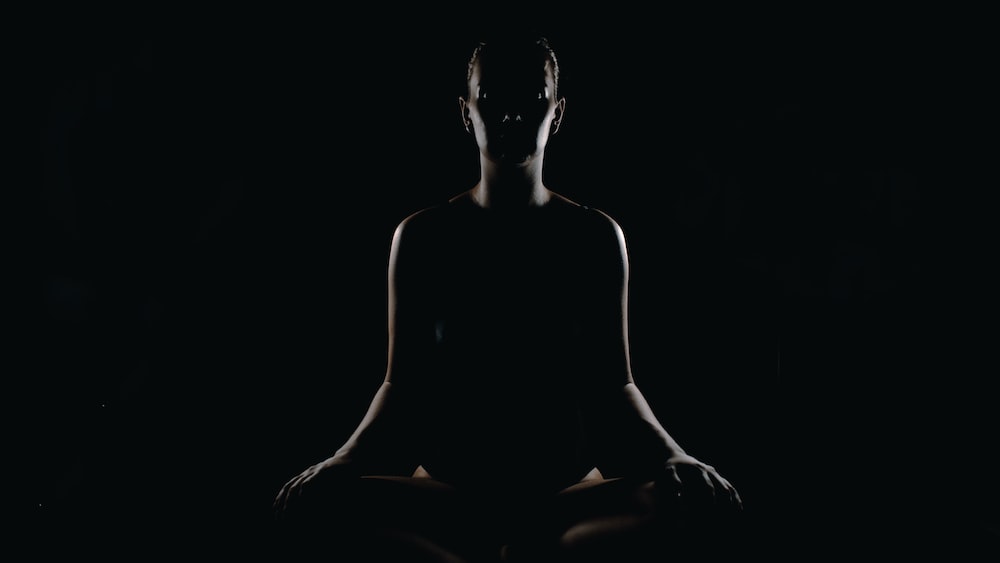 Mindfulness meditation pose for workplace productivity