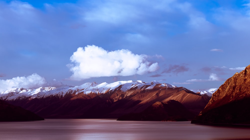 Mythical Serenity: Snowy Mountain and Cloudscape