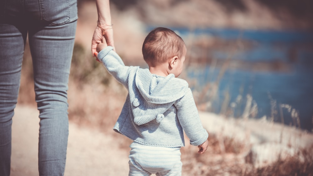 Parent and Toddler Practicing Mindfulness on the Beach