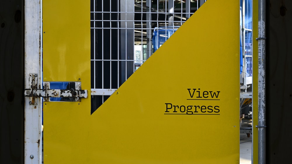Personnel Accountability System: Sneak Peek at the Construction of a Yellow Door with Metal Gate