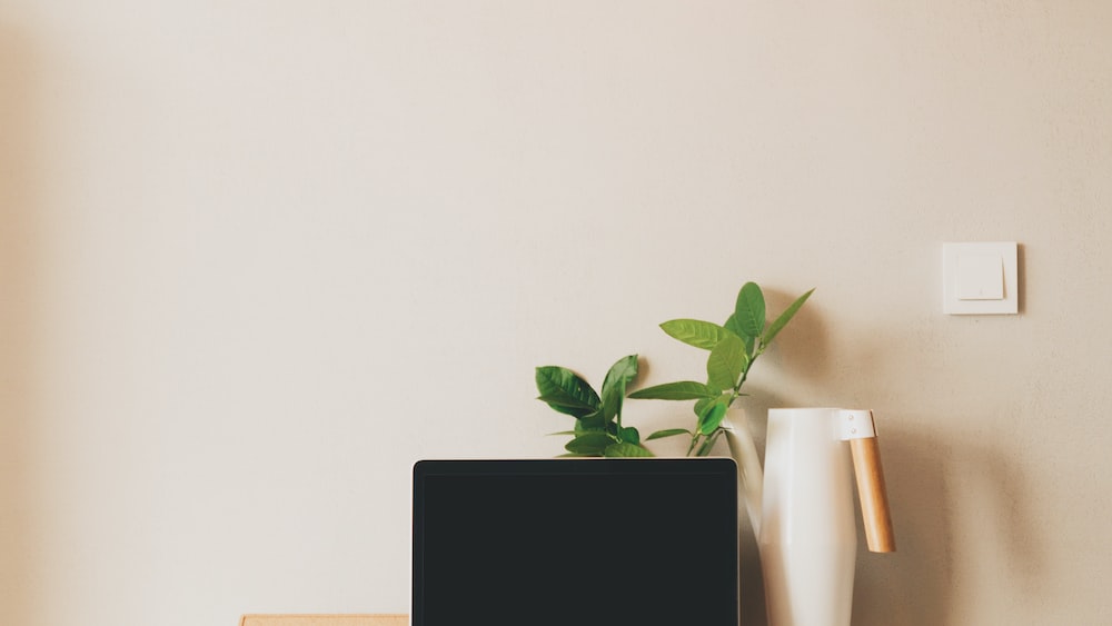 Promoting Workplace Accountability with a Laptop on a Table