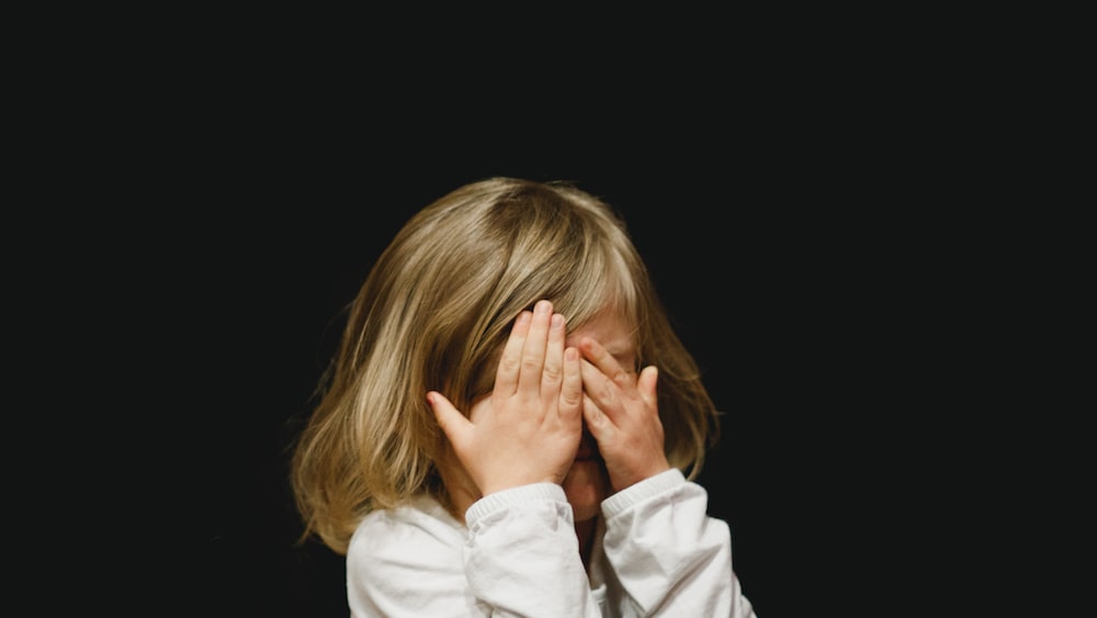 Self-Awareness: A Girl Covering Her Face in Emotional Intelligence