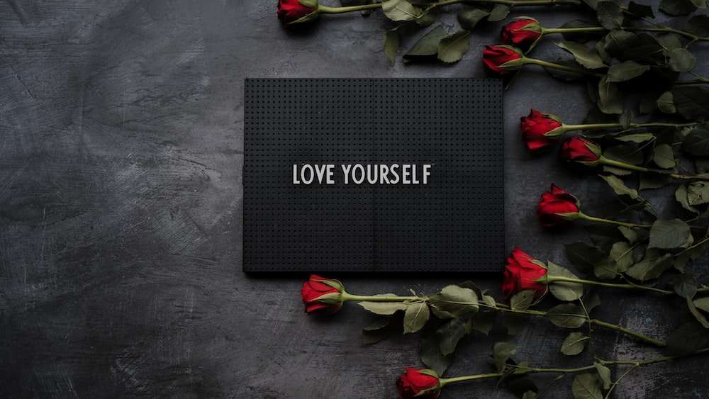 Self Growth with Love Yourself Sign
