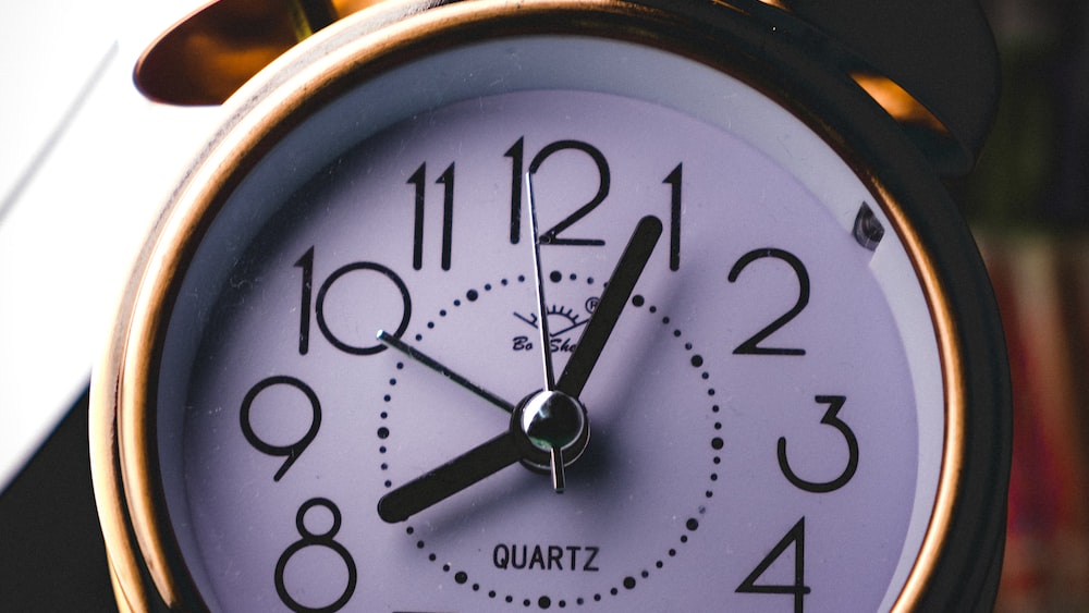 Silver Alarm Clock Reminder for Time Management Mistakes