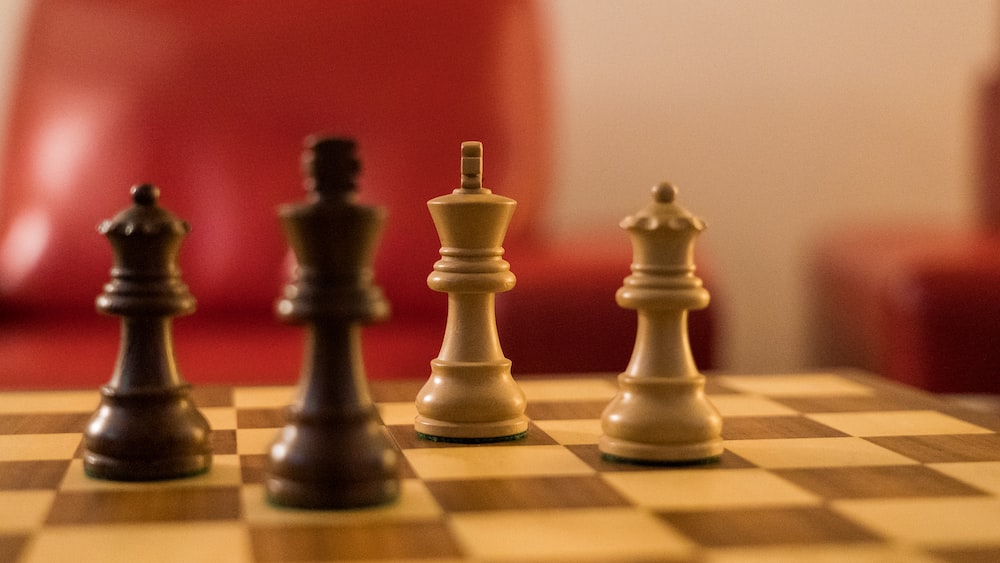 Strategic Chess Battle: King and Queen on the Board