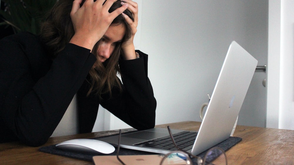 Visualizing Emotional Turmoil: A Stressed Businesswoman Seeking Self-Awareness